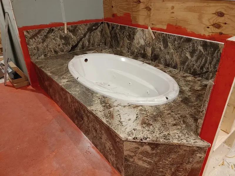 Stone tub deck and surround during installation